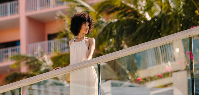 Woman enjoying the view of the Marina at the Hamilton Princess Bermuda