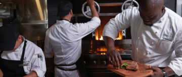 Steak prepared on an open fire grill at Intrepid Restaurant Bermuda - Hamilton Princess