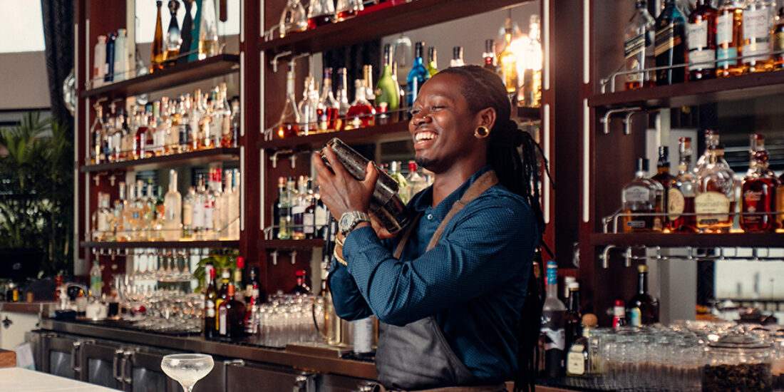 A bar man mixing cocktails at the Hamilton Princess Bermuda